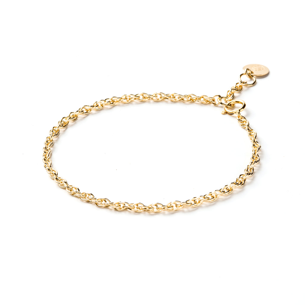 Handmade gold bracelet. Ideal for layering with other gold jewellery for a modern look. Unique jewellery from Wanderlust Life. Minimalist jewellery made in Devon in the UK.