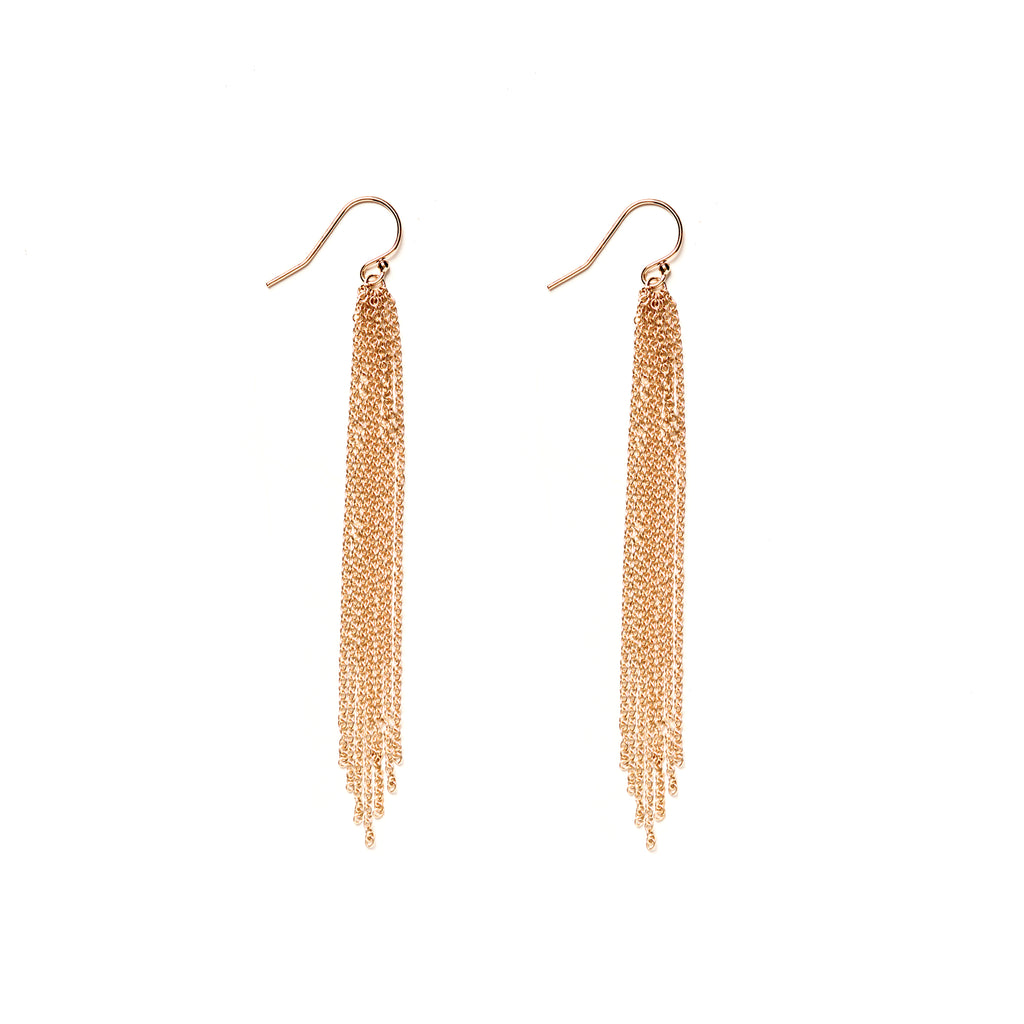 From Wanderlust Life AW22 collection - When Darkness Falls. The Starfall tassel drop earrings, designed inspired by liquid metal. The perfect statement earrings. 14k gold fill jewellery. Proudly designed and handcrafted in our studio in Devon, UK.