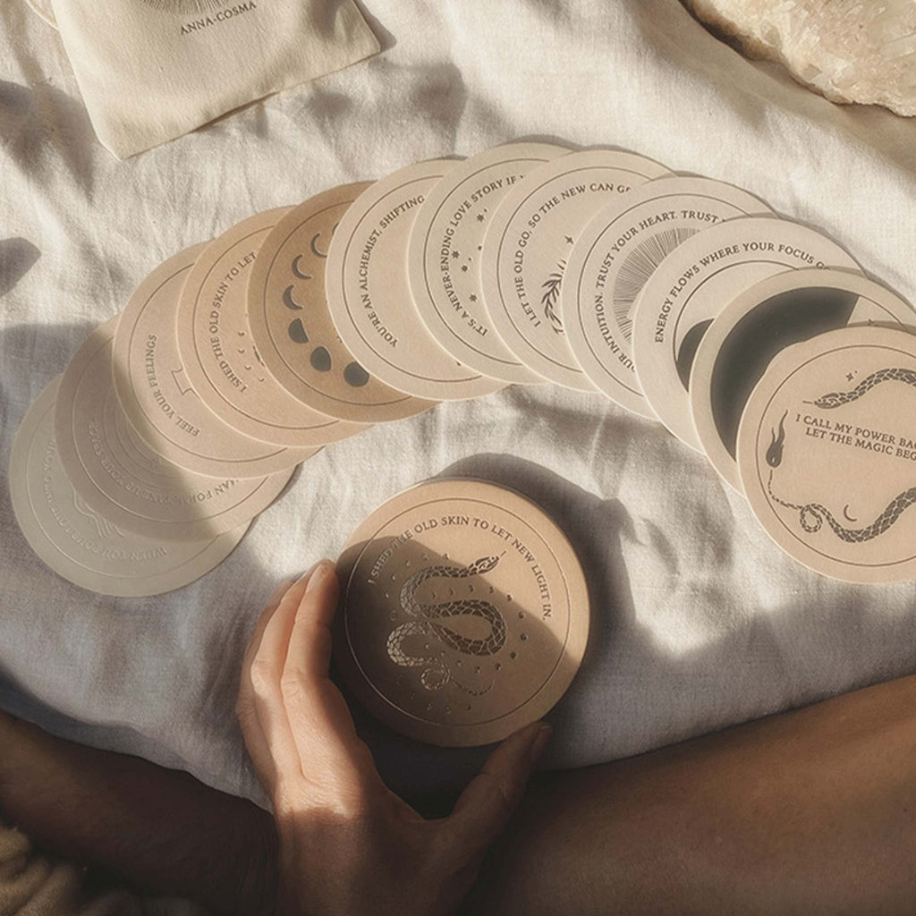 Circular cards with gold-foil embossed mantras, affirmations and illustrations. Designed by Anna Cosma