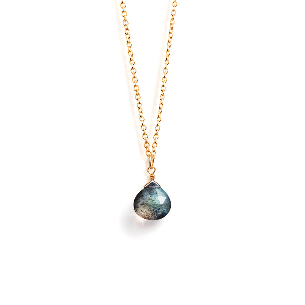 An Iridescent Labradorite Gemstone on a fine gold fill chain necklace. Minimal and modern gemstone jewellery, designed and handcrafted in Devon, UK.
