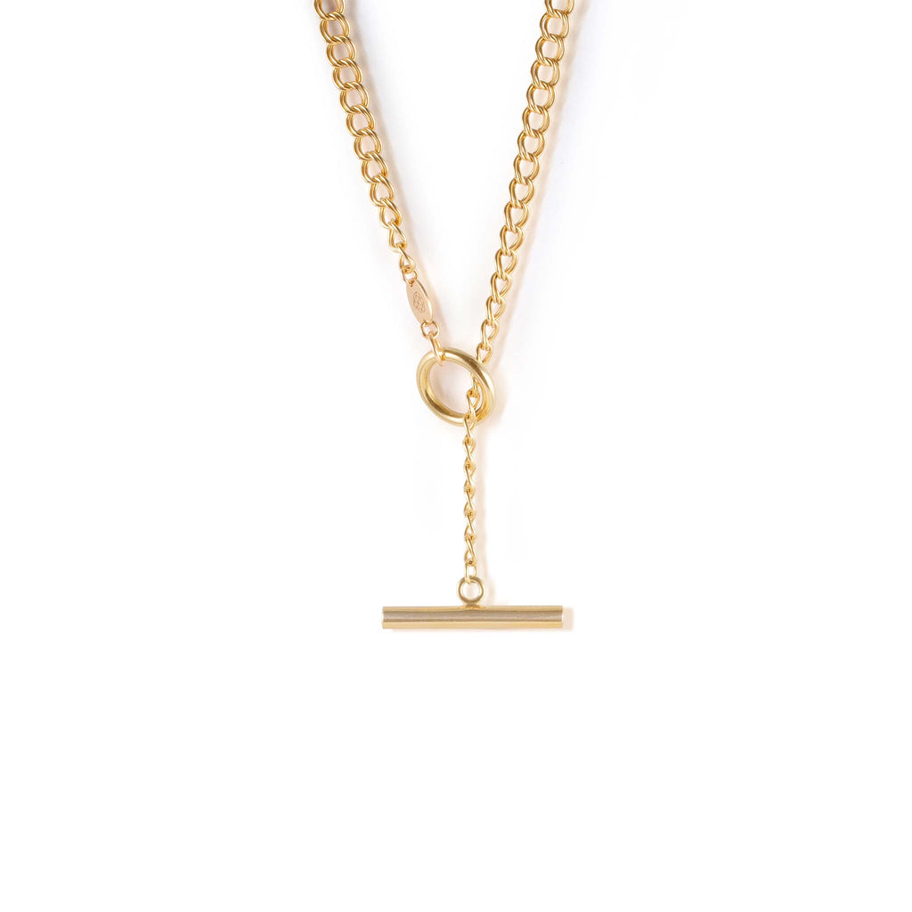 The Morgan Necklace features a gold vermeil double curb chain with a T-bar toggle style fastening that doubles as a pendant and a clasp.