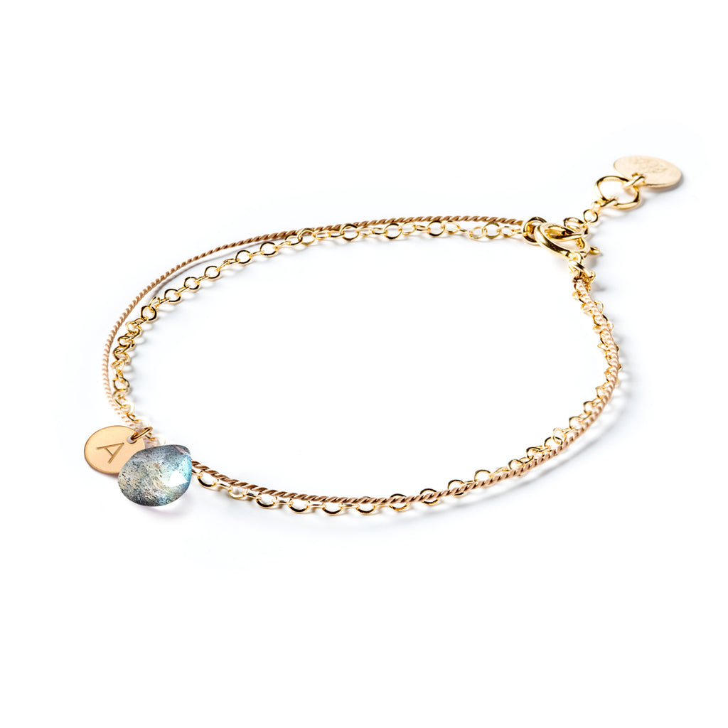 Personalised with an initial tag, 14k gold & silk iridescent labradorite bracelet. Wanderlust Life Ethically Handmade jewellery made in the UK.  Shop meaningful personalised gifts.