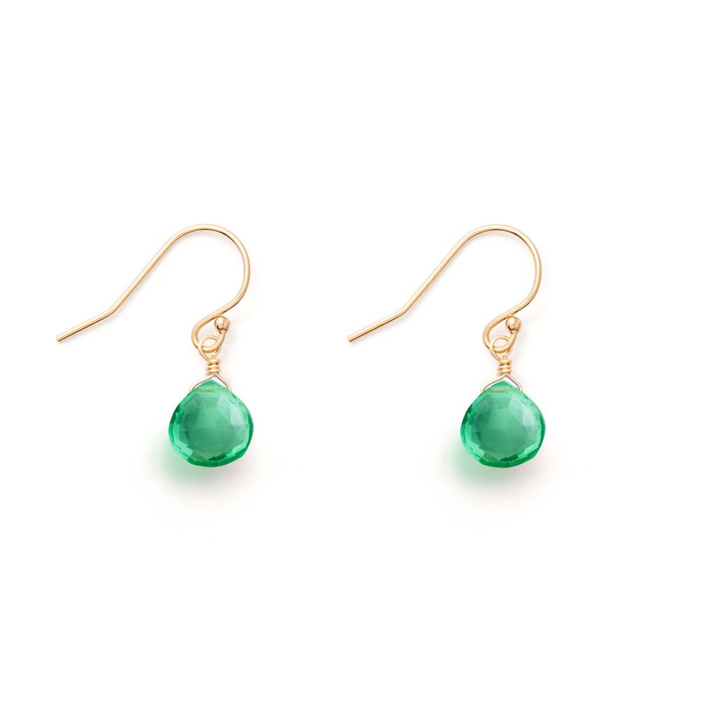 Sparkly translucent gemstones in a seafoam green hue hang from gold-fill ear wires. Modern and minimal gemstone earrings.