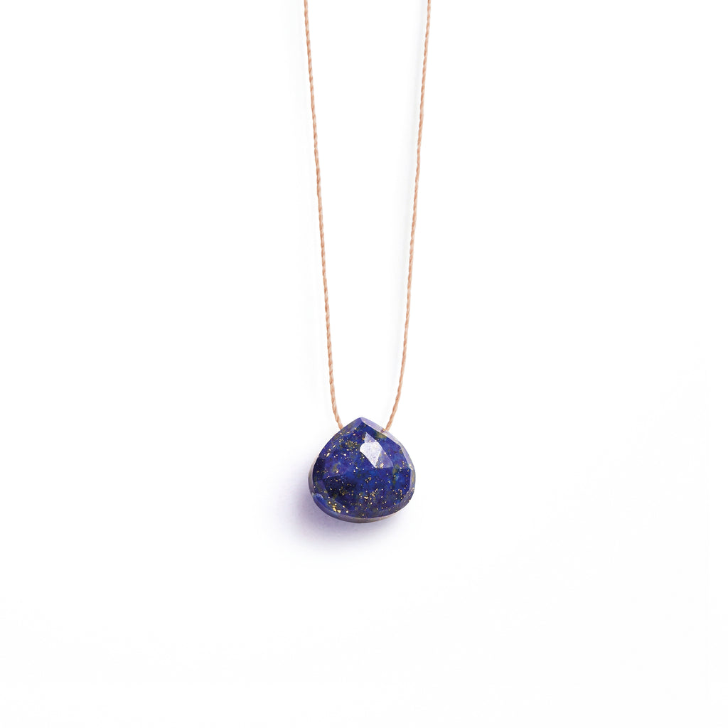 Blue Lapis Lazuli Fine Cord Necklace. Blue Lapis Lazuli gemstone in our signature faceted shape on a fine cord necklace. Proudly designed in Devon & handcrafted by our Wanderlust Life jewellery makers in the UK.