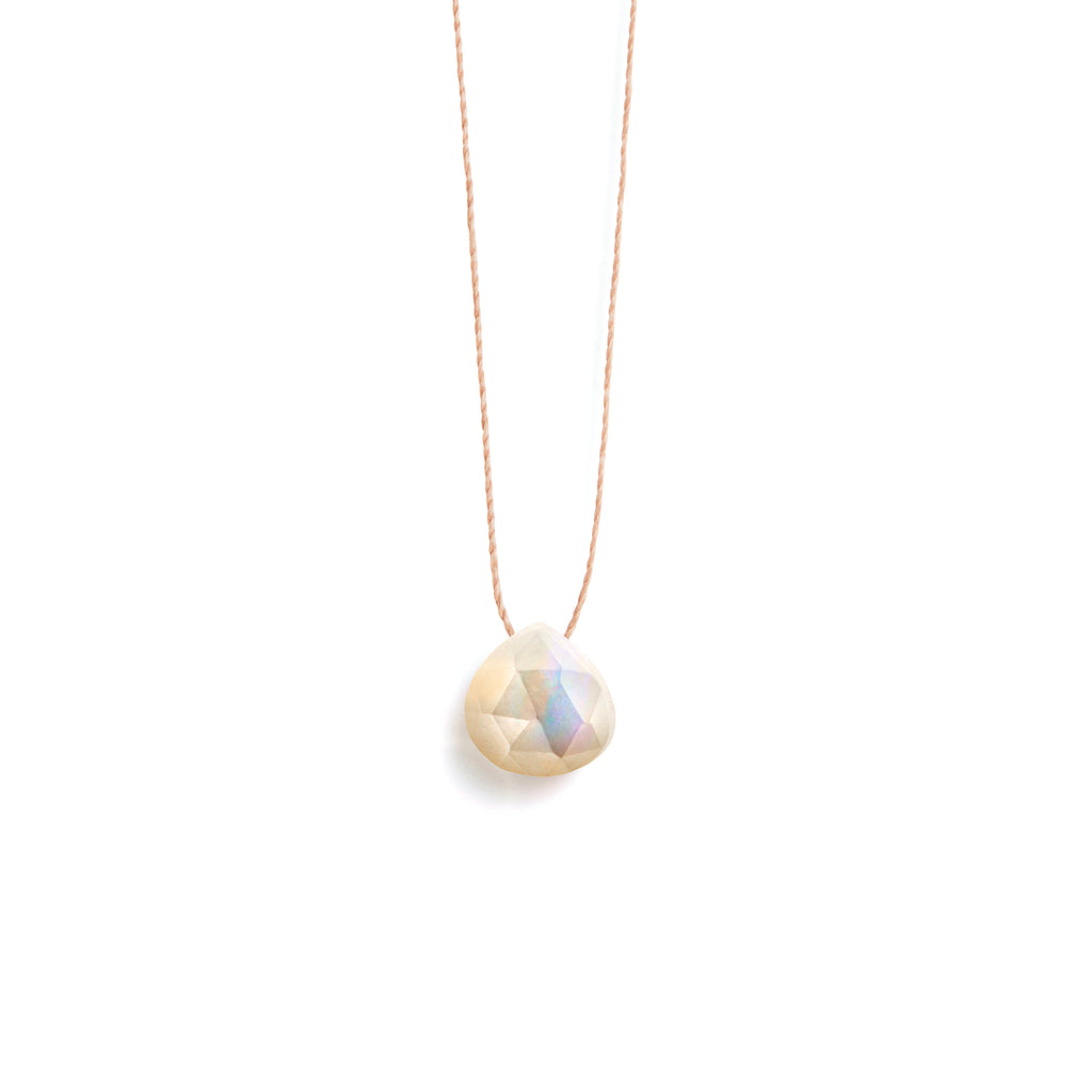 Mother of Pearl Fine Cord Necklace. Mother of Pearl in our signature faceted shape slides on a delicate and minimalist fine cord necklace. Proudly designed in Devon & handcrafted by our Wanderlust Life jewellery makers in the UK.