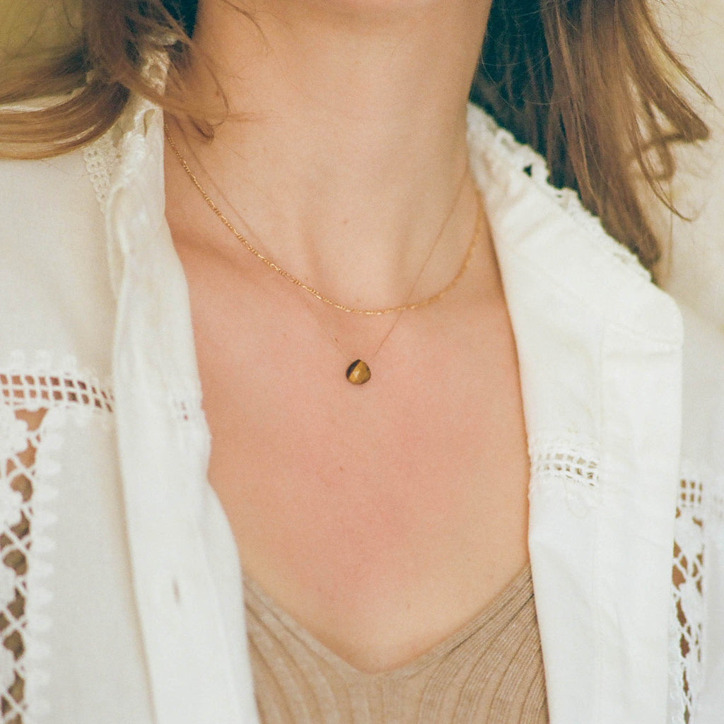 Wanderlust Life Ethically Handmade jewellery made in the UK. Minimalist gold and fine cord jewellery. tiger's eye fine cord necklace