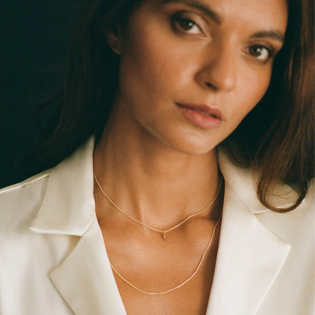 Wanderlust Life Celine Chain Necklace. Minimal gold curb chain necklace. Traditional yet modern style chain. Perfect for layering, wear as a necklace or a statement bracelet. Designed and handcrafted in our Devon studio. Shop affordable, everyday luxury jewellery online at Wanderlust Life.
