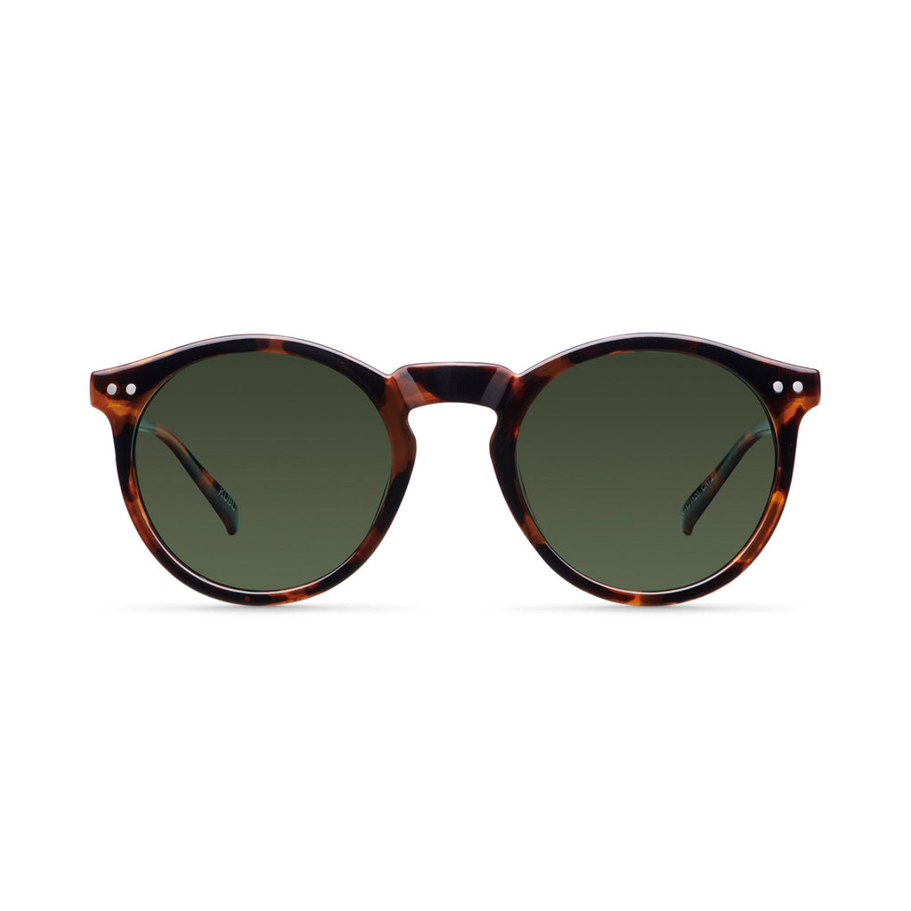 Proudly stocked Wanderlust Life, Meller sunglasses were founded in the heart of Barcelona. The Meller 'Kubu Tigris' olive sunglasses are characterised by their rounded, vintage inspired design with polarised lenses for extra eye protection. 