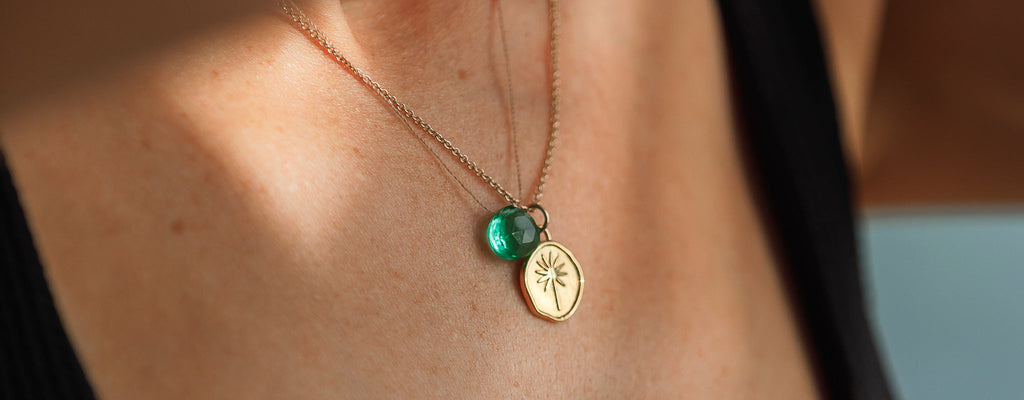 Terra jewellery for Earth Signs - Taurus, Virgo and Capricorn. Terra is a golden pendant featuring a palm tree, a golden layering necklace.