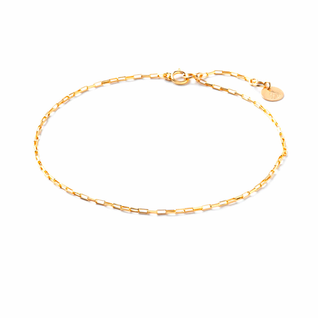 Wanderlust Life gold chain Arca anklet. Adjustable size 9" - 10" with gold fill hand stamped tag. Handmade jewellery in the UK.