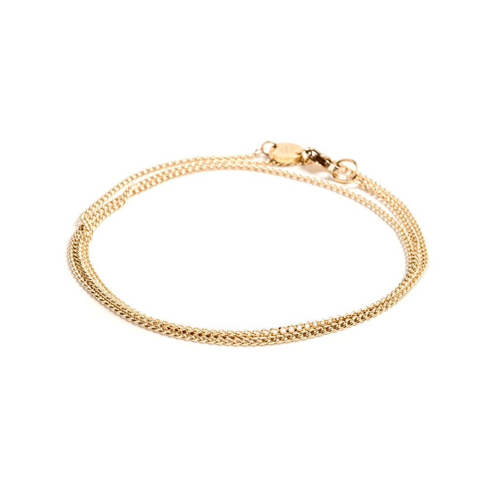 Gold Chain Bracelet, Celine. This versatile flat, slinky curb 20.5 inch bracelet is a two-in-one piece designed to be worn as a necklace or wrapped twice around the wrist as a bracelet. Proudly designed in Devon & handcrafted by our Wanderlust Life jewellery makers in the UK.