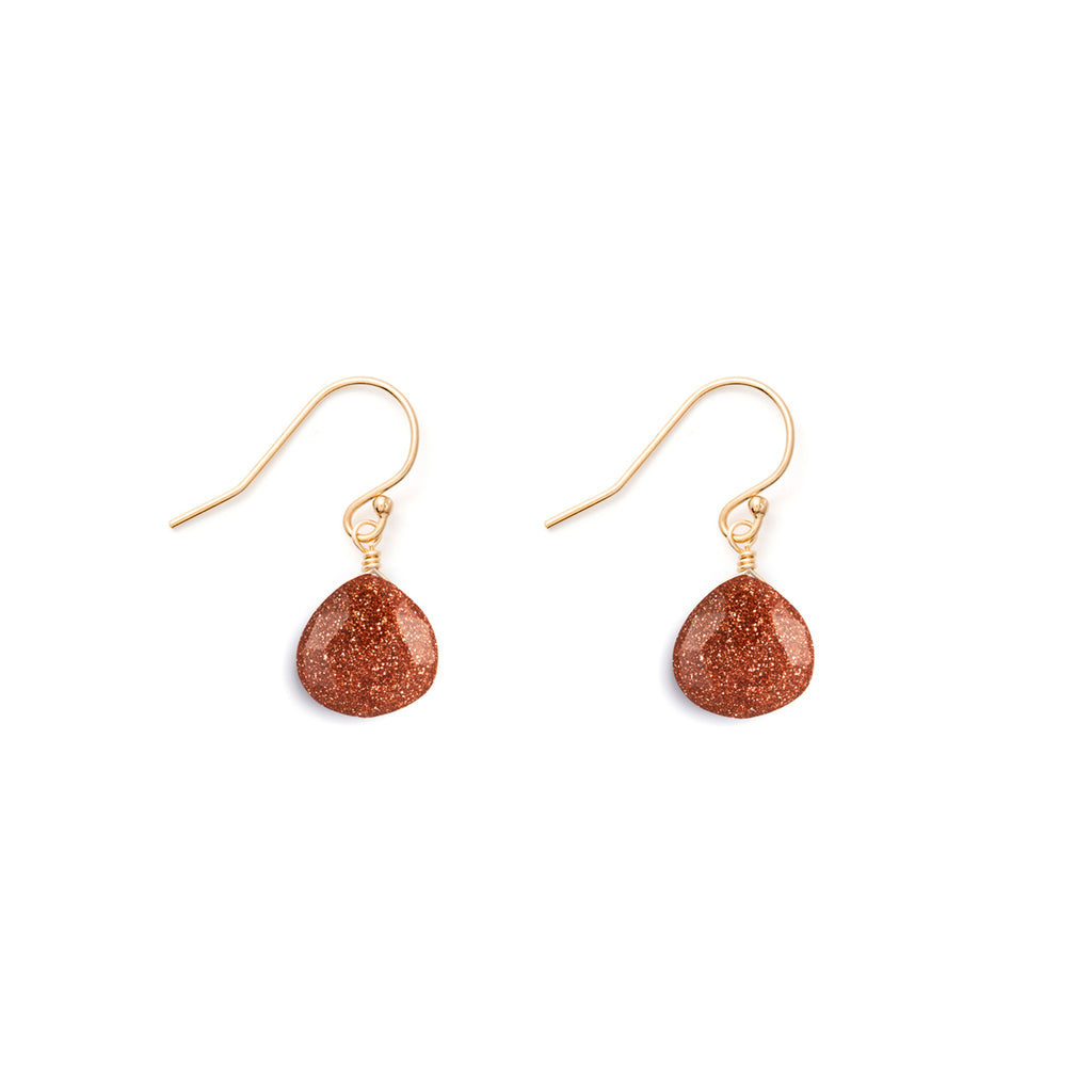 Goldstone in our signature faceted shape hangs from a minimalist gold ear wire for an effortless, laid-back look.