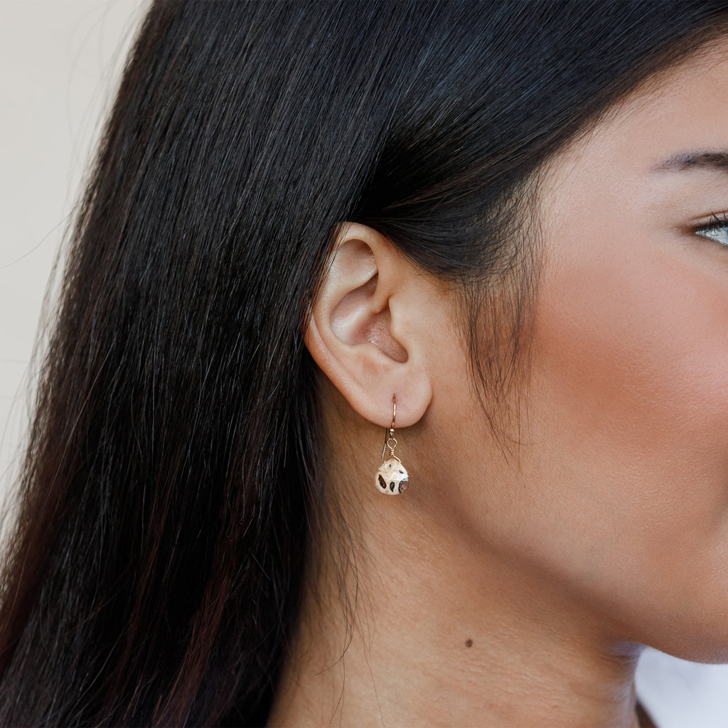 Leopard Jasper in our signature faceted shape hangs from a minimalist gold ear wire for an effortless, laid-back look.