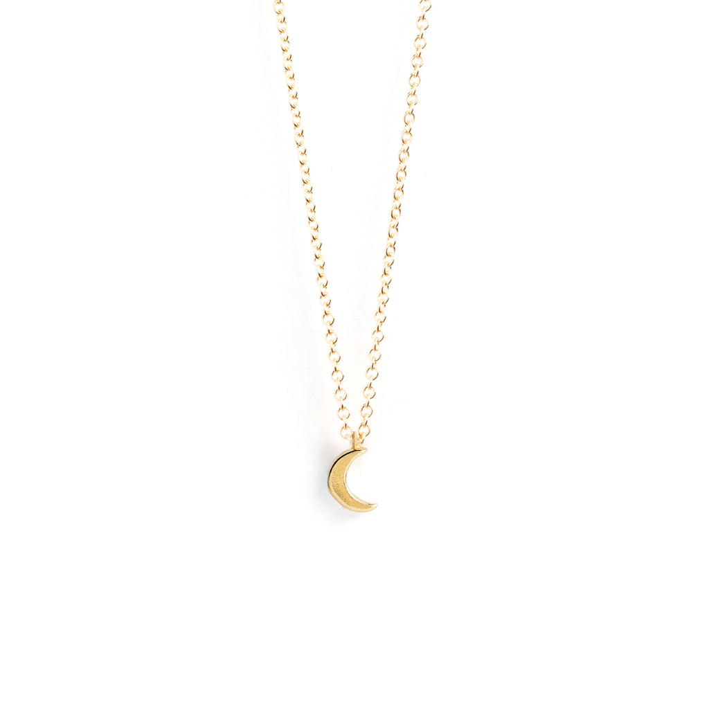 Petite Luna Fine Gold Chain Necklace. A delicate 14k gold fill chain necklace with a handcrafted Luna Crescent pendant. Proudly designed in Devon & handcrafted by our Wanderlust Life global artisan partners.