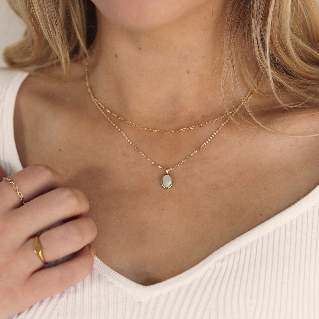 Wanderlust Life engravable Cheval necklace. A mother of pearl pendant hangs from a 14 carat gold fill chain necklace. Launching this Mother’s Day, perfect for gifting. Engrave with a name, date or love note to make an extra special gift. Proudly designed in Devon & handcrafted by our Wanderlust Life global artisan partners.