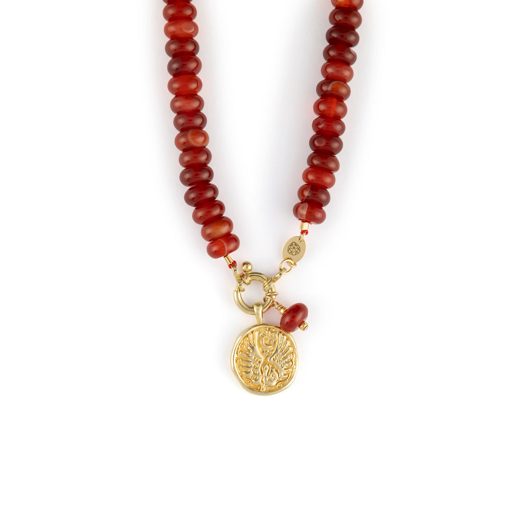 Chunky Red Agate gemstones on a doughnut beaded necklace with a golden ring fastening like a ship’s wheel, designed to sit front and centre. Featuring a Libra Zodiac Pendant Necklace.