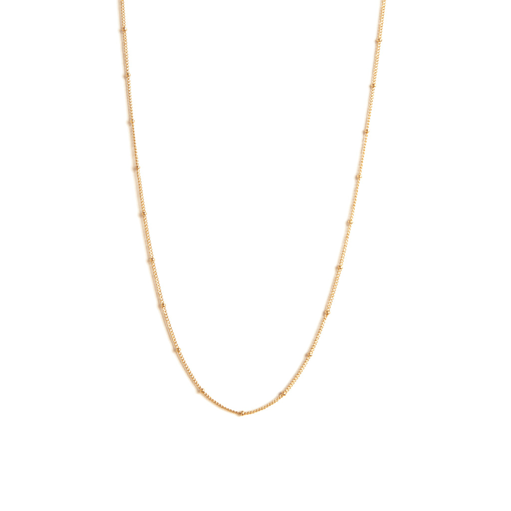 Wanderlust life 14k gold fill 17 inch Satellite necklace, with tactile gold bead accents and detailing. Perfect gift for layering gold chain necklaces. Proudly designed in Devon & handcrafted by our Wanderlust Life jewellery makers in the UK.