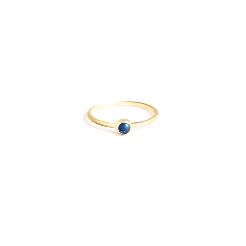 Wanderlust Life Birthstone Jewellery Collection. New September birthstone gold ring with sapphire semi precious gemstone, the perfect gift of jewellery. Wanderlust Life handmade jewellery in the UK.
