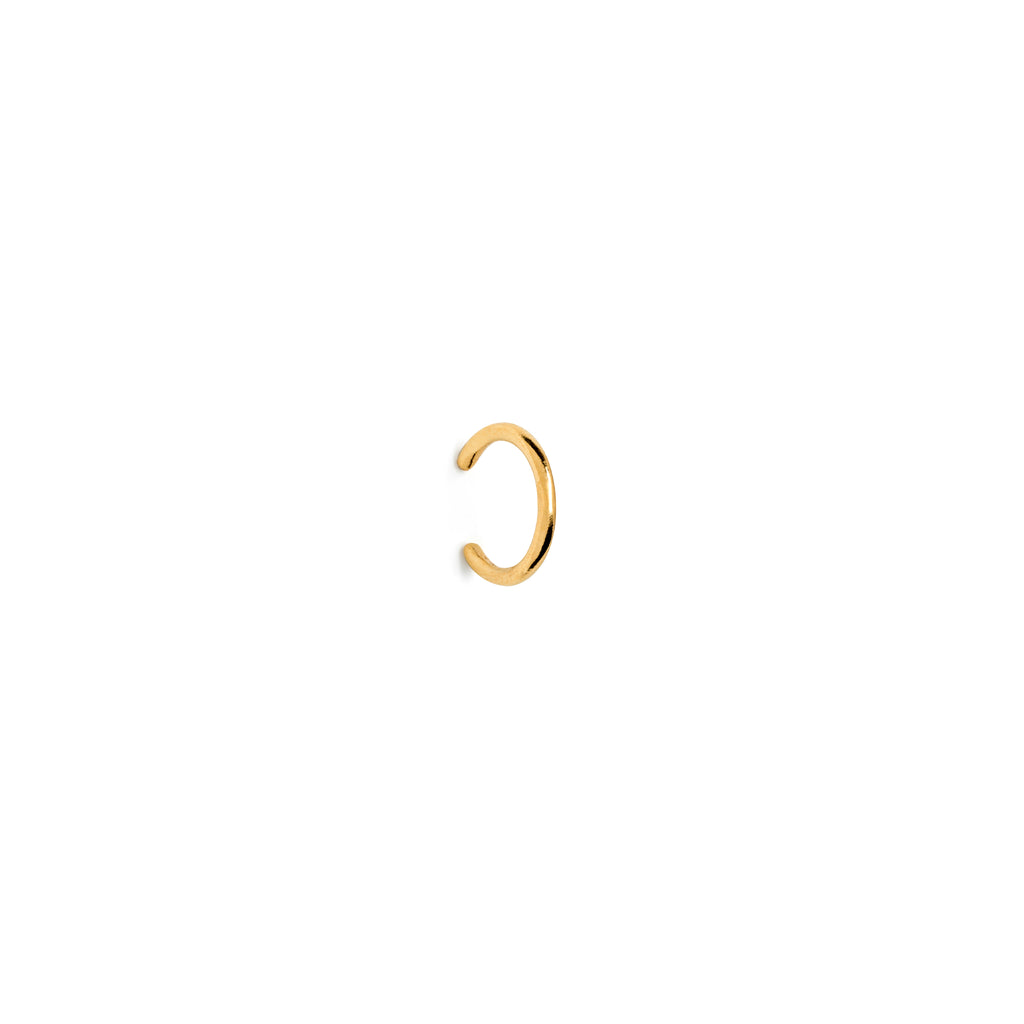 Minimal and modern gold vermeil slim ear cuff. Perfect for earring styling and stacking. Modern and minimal gold plated jewellery, designed in the UK. Quality luxury jewellery for everyday.