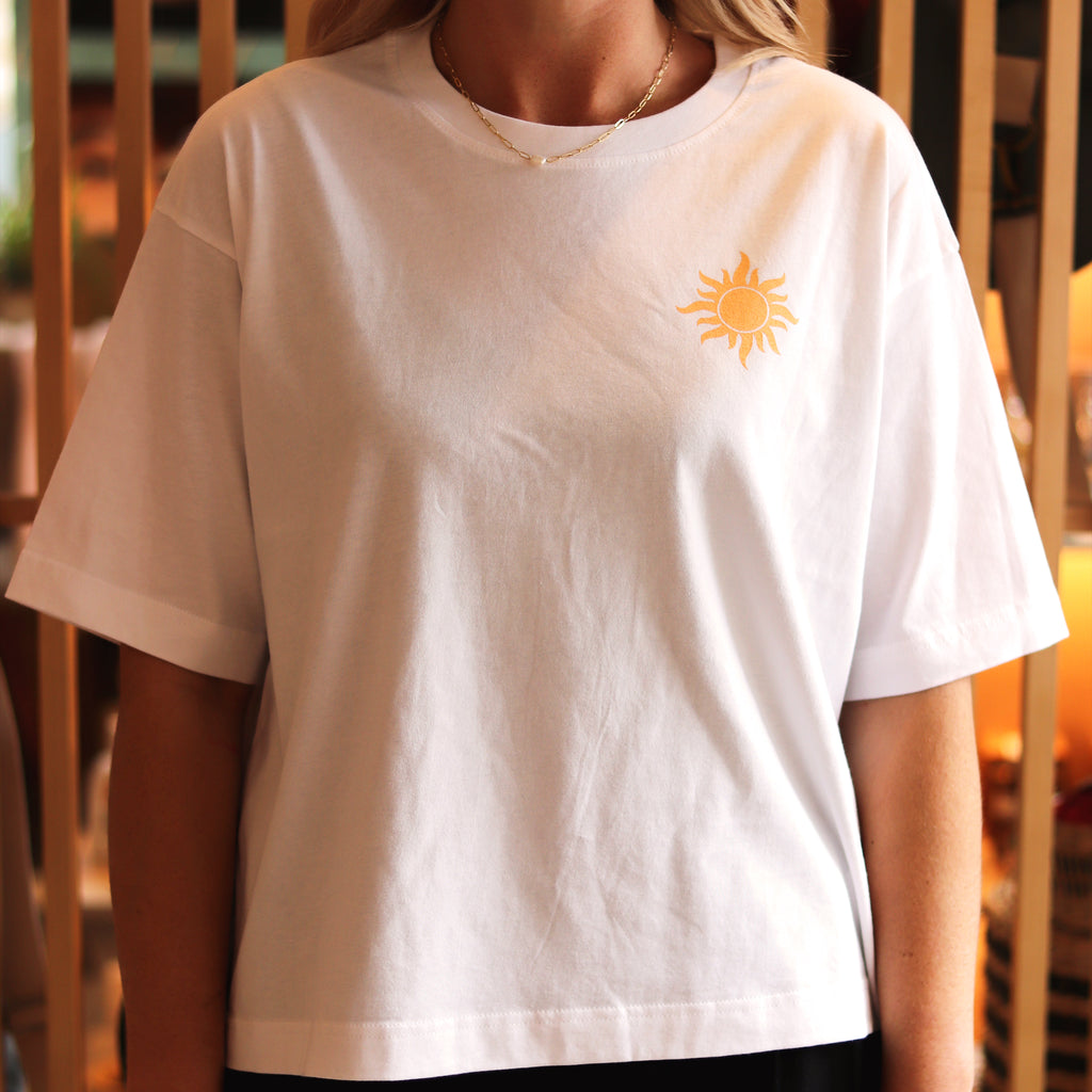 Cut for a relaxed fit and made from organic cotton, our Sunshine Statement t-shirt features a vibrant sun screen printed on the front and le soleil on the back.