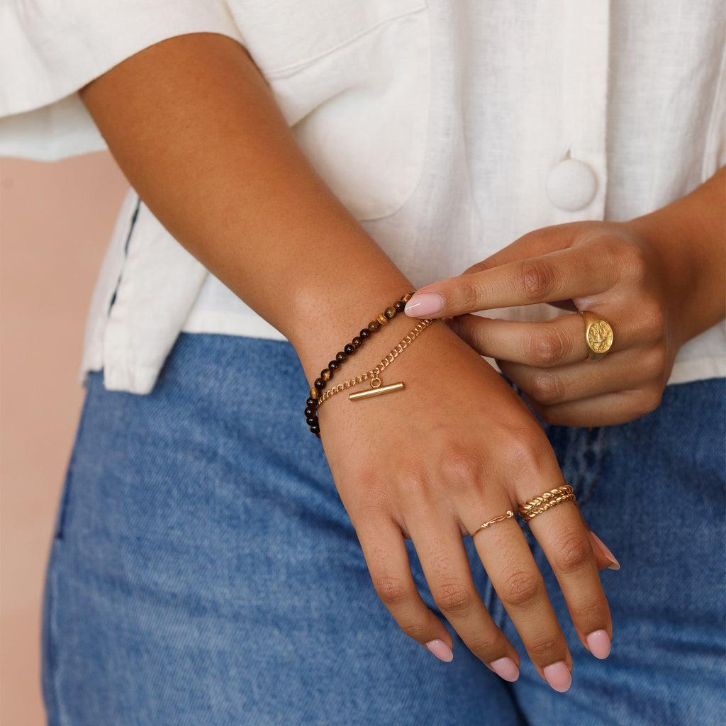 Model wearing Megan Double Curb Toggle Bracelet with the Kikko Layering Bracelet.