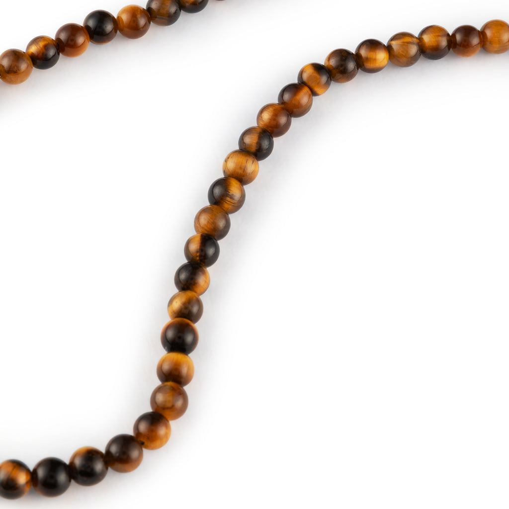 A warm, earthy beaded piece in golden Tiger’s Eye.
