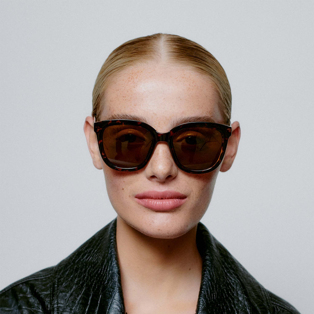 A sophisticated and oversized style with large lenses and brown tortoise frames.