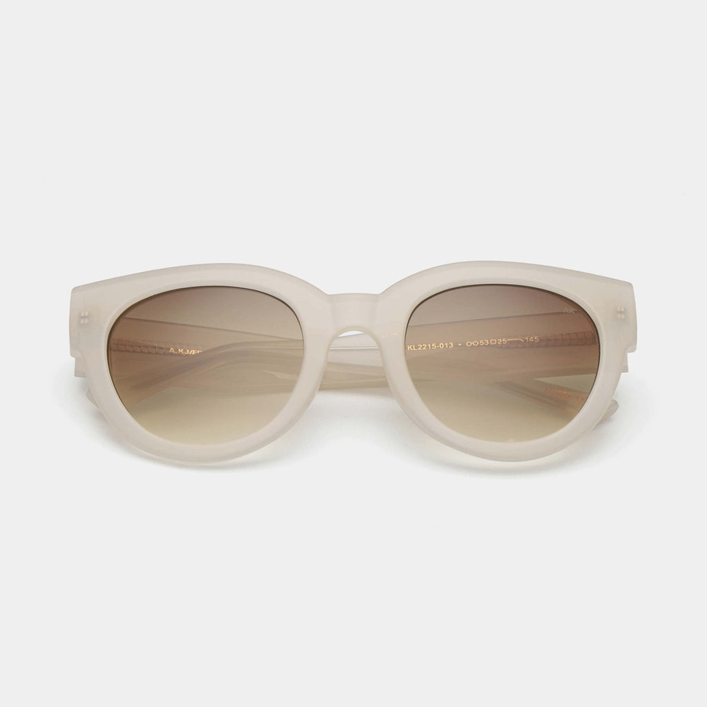 Lilly Sunglasses feature substantial cream frames. Designed in Copenhagen, available at Wanderlust Life.