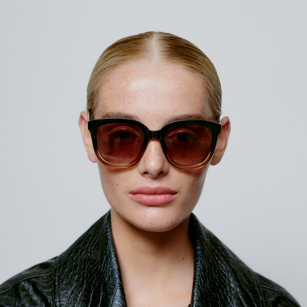 A.Kjaerbede's Billy Sunglasses are an oversized yet elegant style. These frames features a black and brown dual tone, with large oversized lenses which are UV 400 protective.