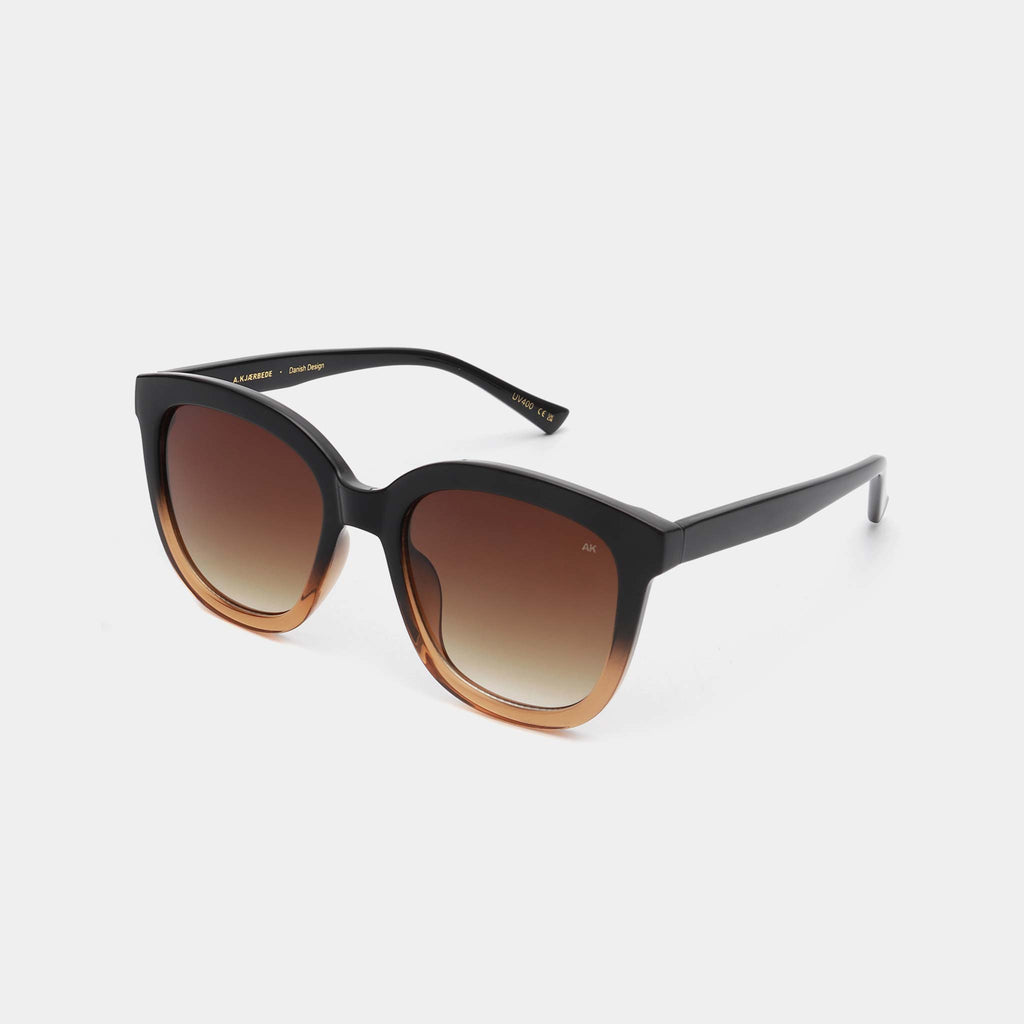 A.Kjaerbede's Billy Sunglasses are an oversized yet elegant style. These frames features a black and brown dual tone, with large oversized lenses which are UV 400 protective.