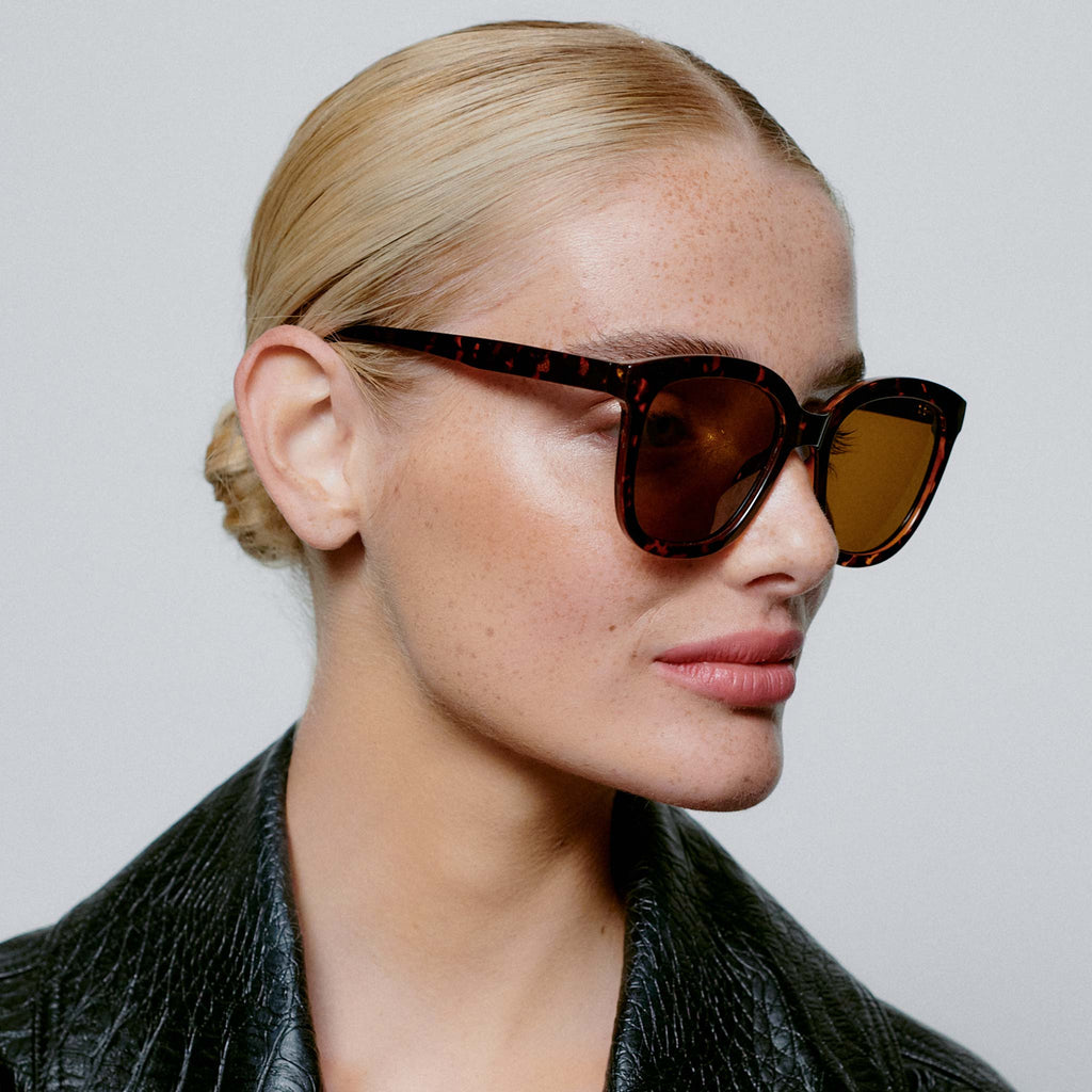 A sophisticated and oversized style with large lenses and brown tortoise frames.