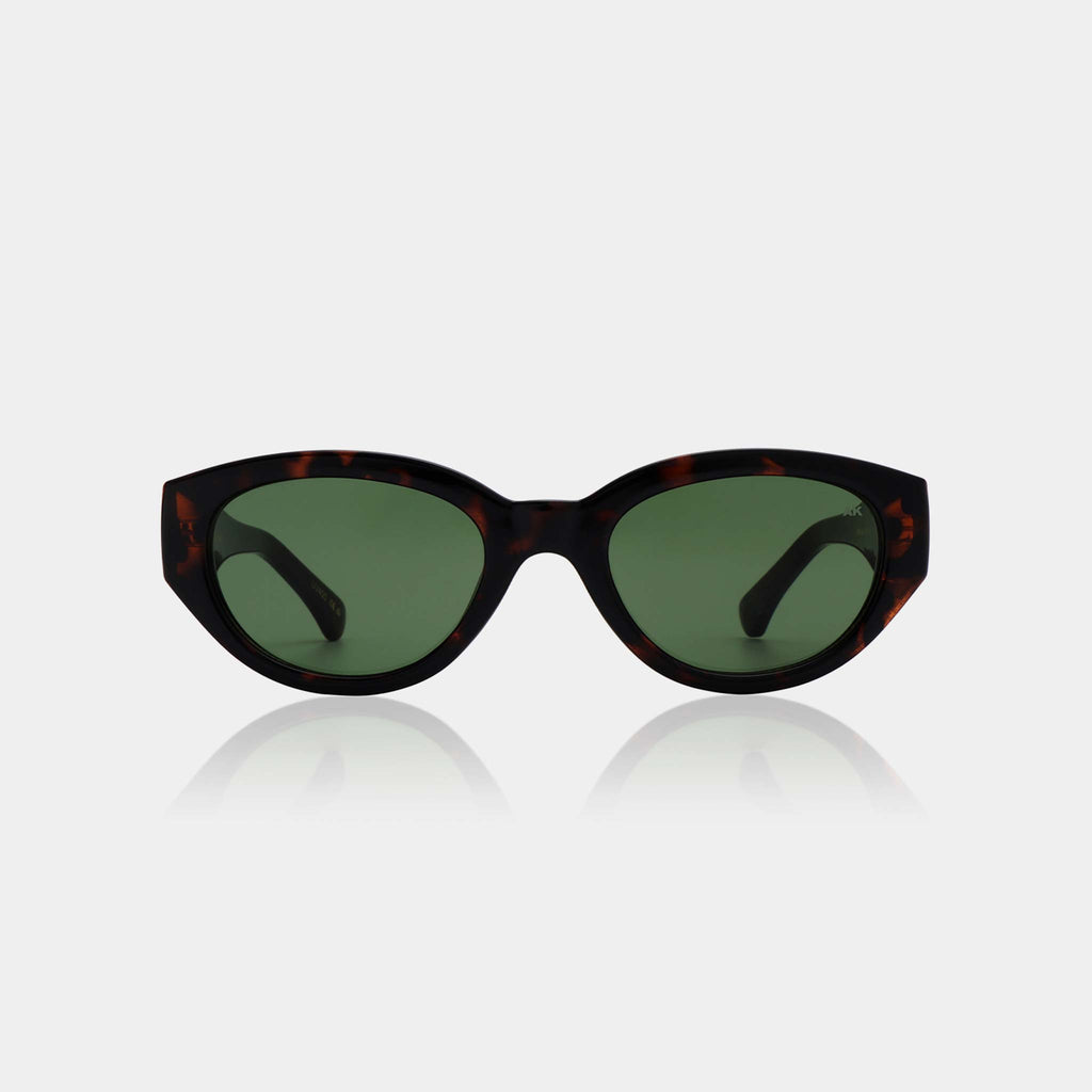 Cat eye sunglasses with a green lens and substantial tortoise frames, designed by A.Kjaerbede. 