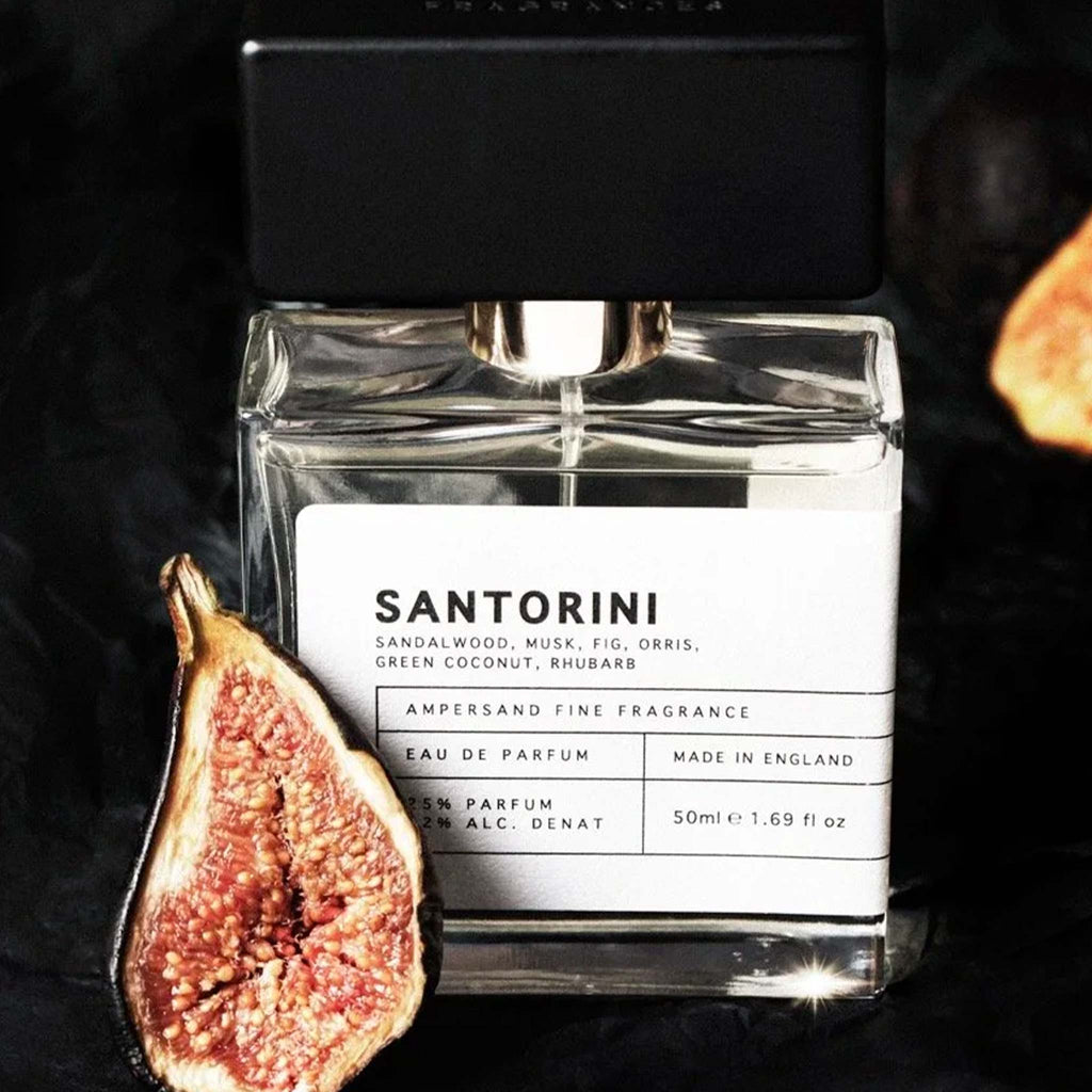 Pictured beside a fig, Santorini perfume bottle, blended with fig and coconut
