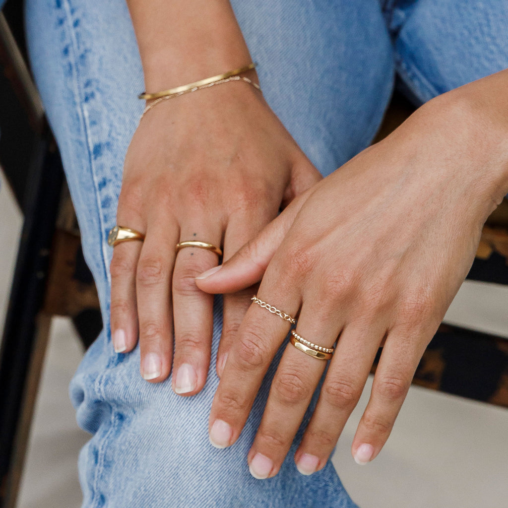 Wanderlust Life amulet chain ring made with gold fill. A minimal and versatile design to easily add to your ring stack. Designed and made in Devon by our jewellery makers.