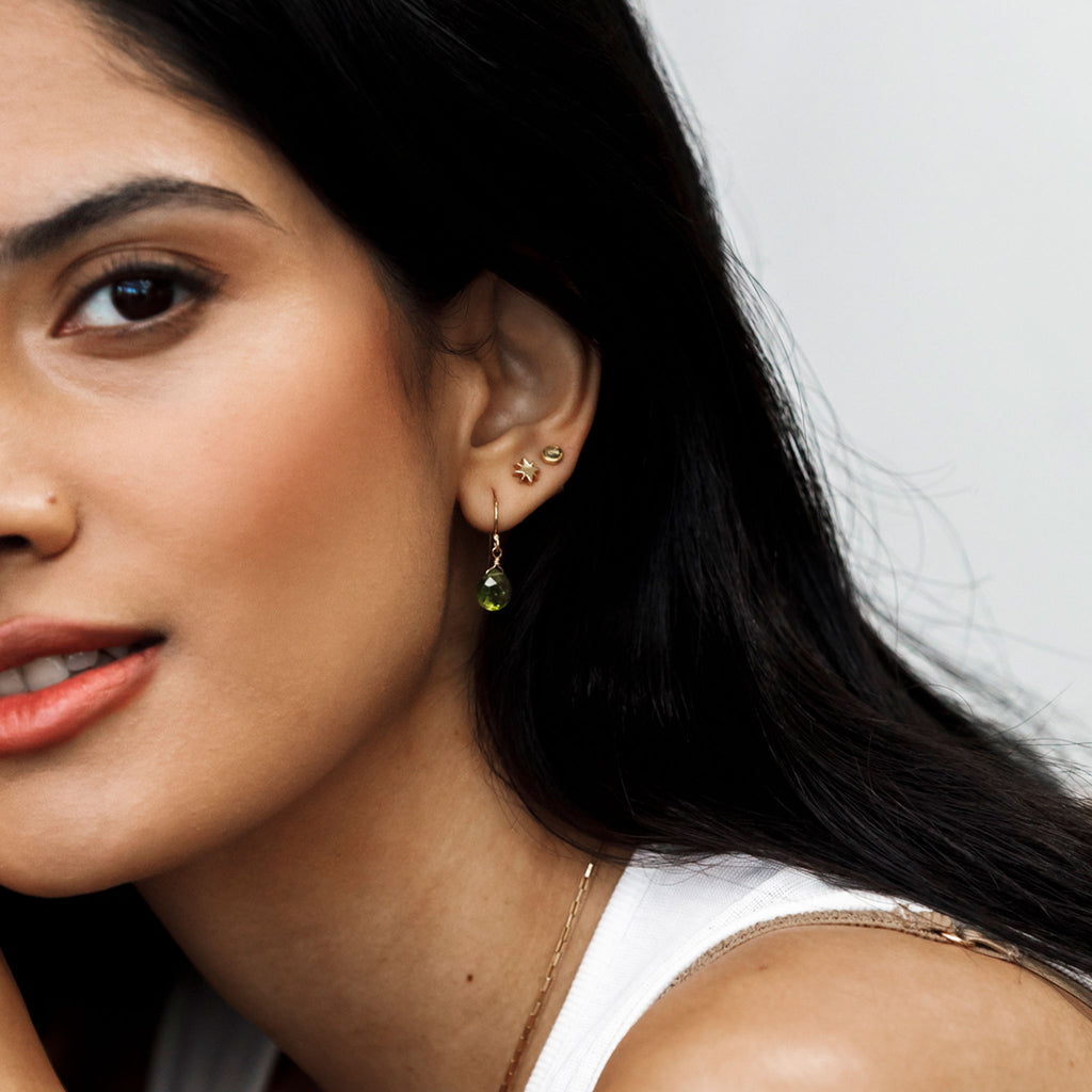 Wanderlust Life Isla drop earring. Peridot Isla drop earring featuring semi precious peridot gemstones and stud earring. Proudly designed in Devon & handcrafted by our Wanderlust Life jewellery makers in the UK