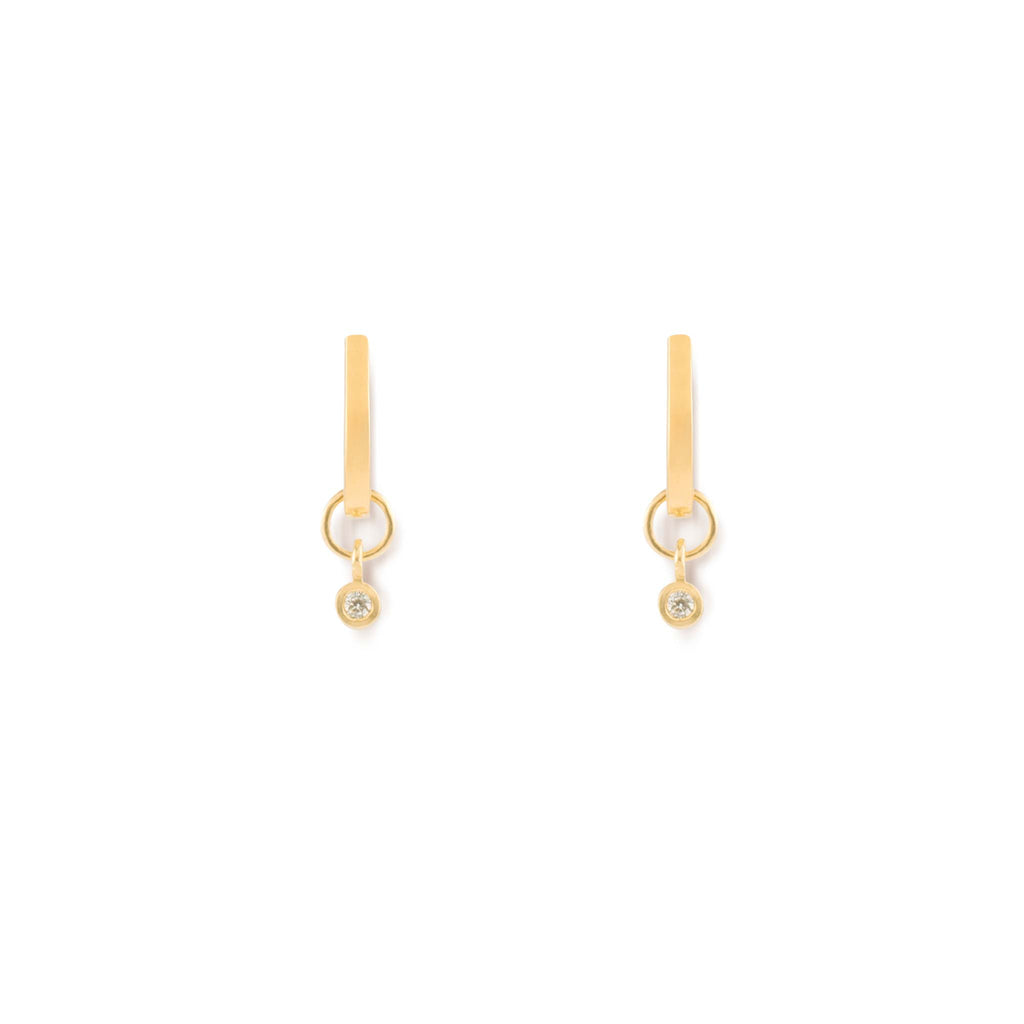 Diamond charms dangle from a solid gold hoop earring. Handcrafted with recycled 9k gold and lab-created diamonds by our Wanderlust Life Global Artisan Partners.