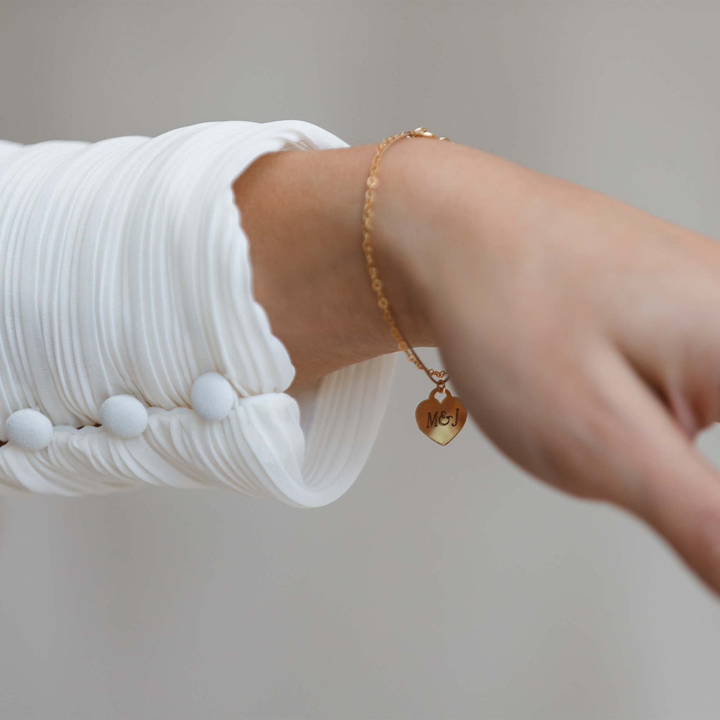 Engraved with M&J, the Love Notes Heart Bracelet makes the perfect meaningful gift. Personalise your bracelet with free engraving.