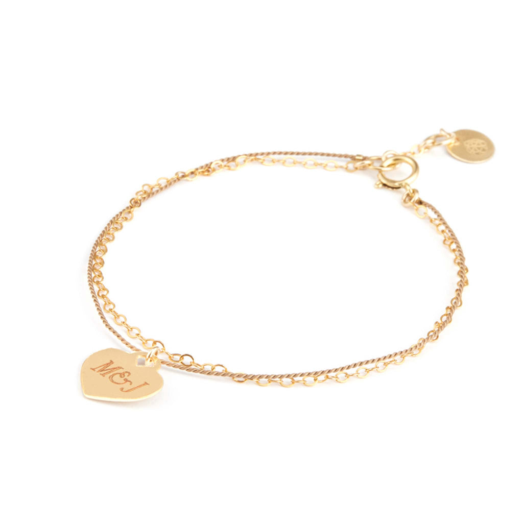 Engraved with M&J, the Love Notes Heart Bracelet makes the perfect meaningful gift. Personalise your bracelet with free engraving.