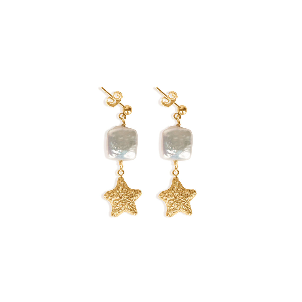 Wanderlust Life Eventide Drop Earrings. Square pearls and gold starfish drop from minimal gold stud earrings. New in the Sea Dreams collection, these statement studs are a must-have jewellery accessory this summer. Discover the Sea Dreams collection online at Wanderlust Life.