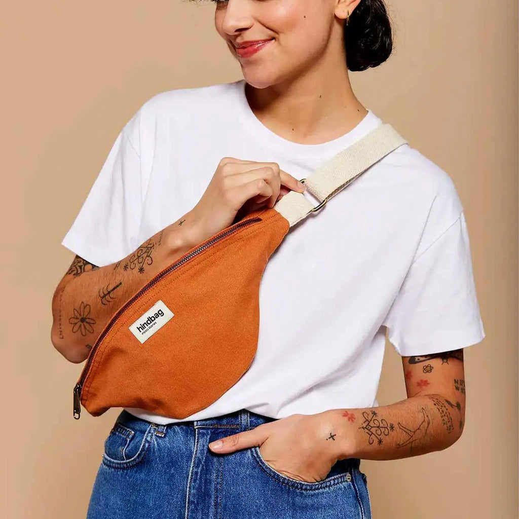 A crossbody bag featuring an adjustable strap, designed to carry your everyday essentials. This bag features a zip to keep items safe, and an adjustable strap.