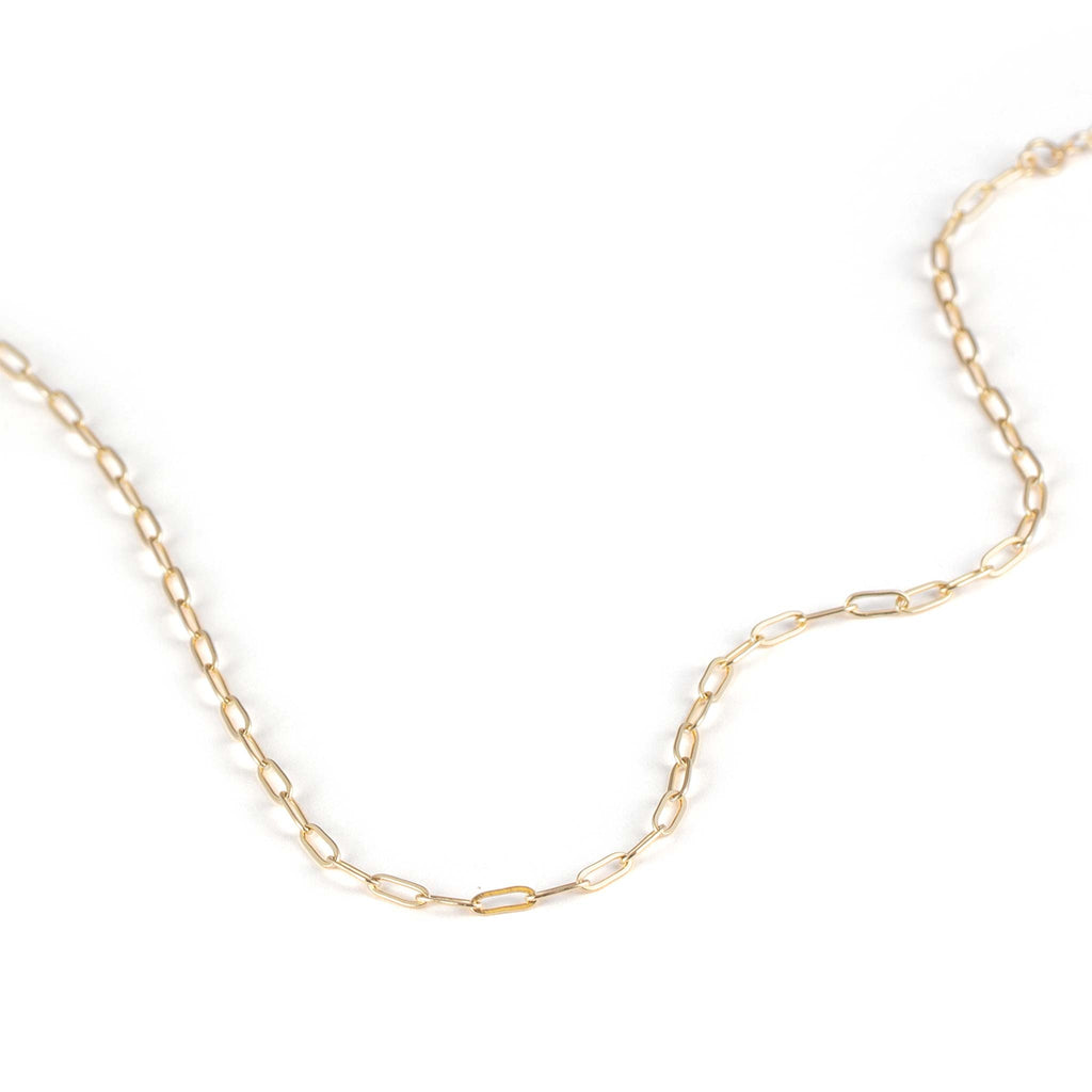 Our modern paperclip chain adds edge to a necklace stack. Handcrafted with 14k gold fill for a lasting gold finish. An adjustable layering necklace to wear between 15 and 17 inches.