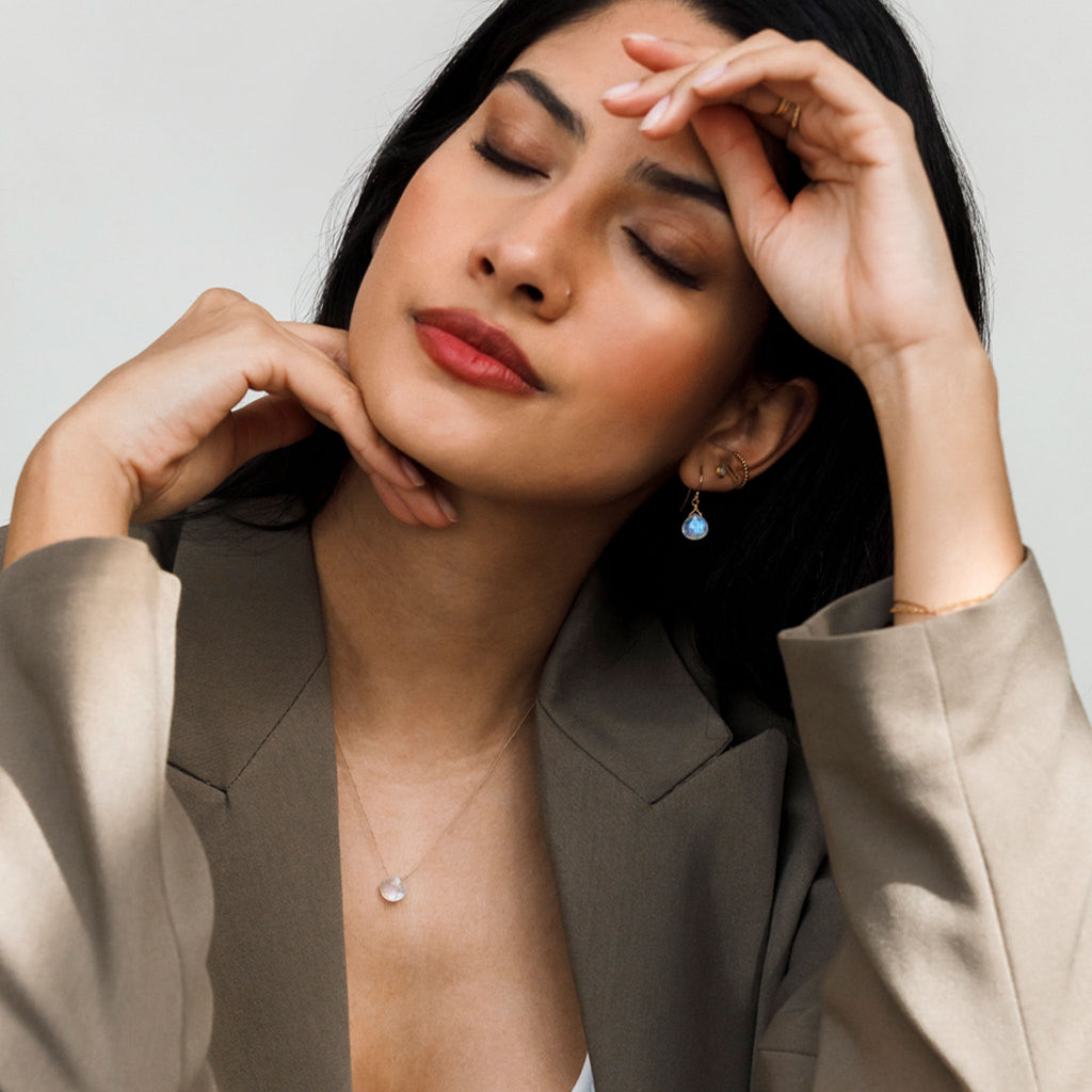 Wanderlust Life Isla drop earring. Rainbow Moonstone Isla drop earring. Drop earrings featuring semi precious rainbow moonstone gemstones. Proudly designed in Devon & handcrafted by our Wanderlust Life jewellery makers in the UK