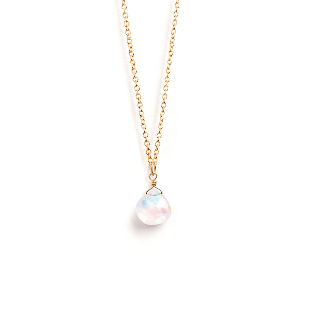 A birthstone necklace for June features a faceted rainbow moonstone gemstone, floating on a minimal 14k gold fill chain.