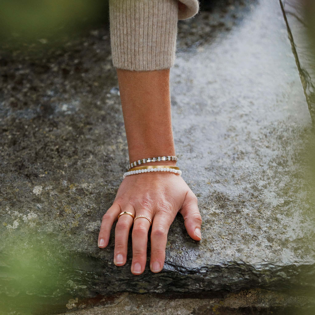 Kai beaded bracelet and gold beaded slider bracelet.