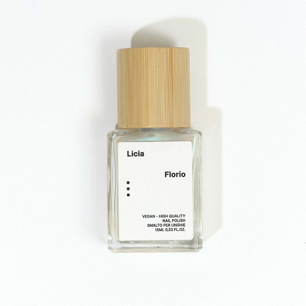 Licia Florio nail polish in the shade 'floral', a colour changing, light reflecting pearly nail varnish that is holographic for a minimal yet sparkling manicure.