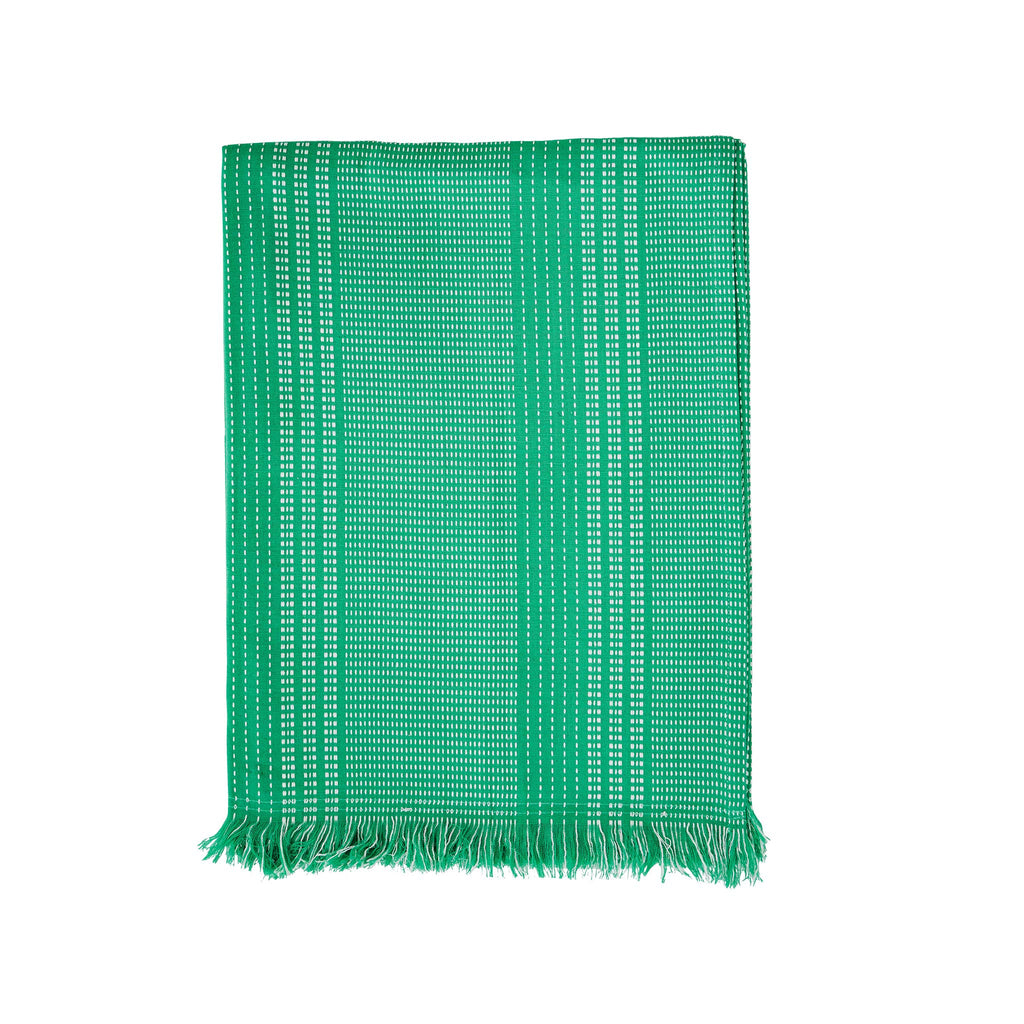 A bright green Hammam Towel featuring stripes of white creating a contrasting pattern and a subtle fringed detail.