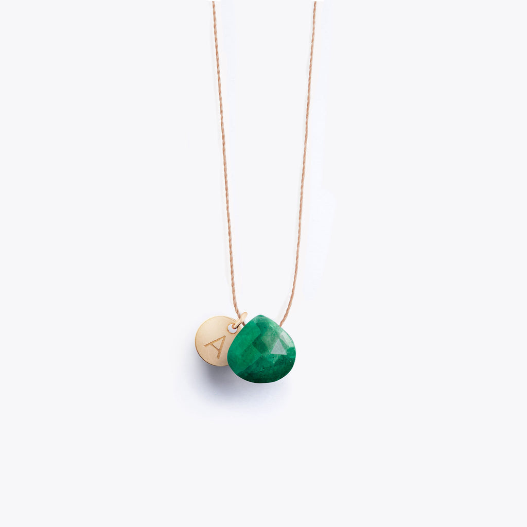 Wanderlust Life Ethically Handmade jewellery made in the UK. Minimalist gold and fine cord jewellery. Personalised May green emerald fine cord necklace with 14k gold fill personalisation tag