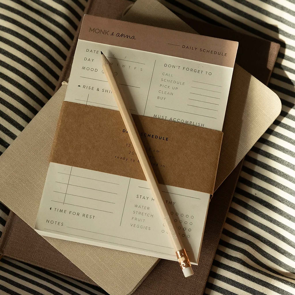 Organise and track your daily schedule with this planner by Monk & Anna.