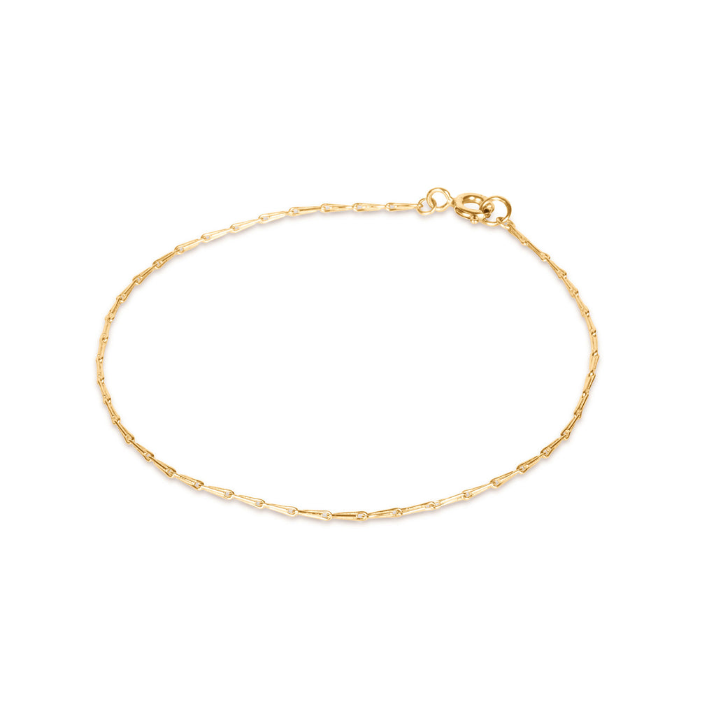 Wanderlust Life Sadie Solid Gold Bracelet. Solid gold hayseed style chain bracelet. A timeless staple and unique bracelet. Minimal and understated jewellery to add to your collection and treasure forever. The ultimate special gift. Designed and handcrafted in our Devon studio. Shop affordable, everyday jewellery online at Wanderlust Life.