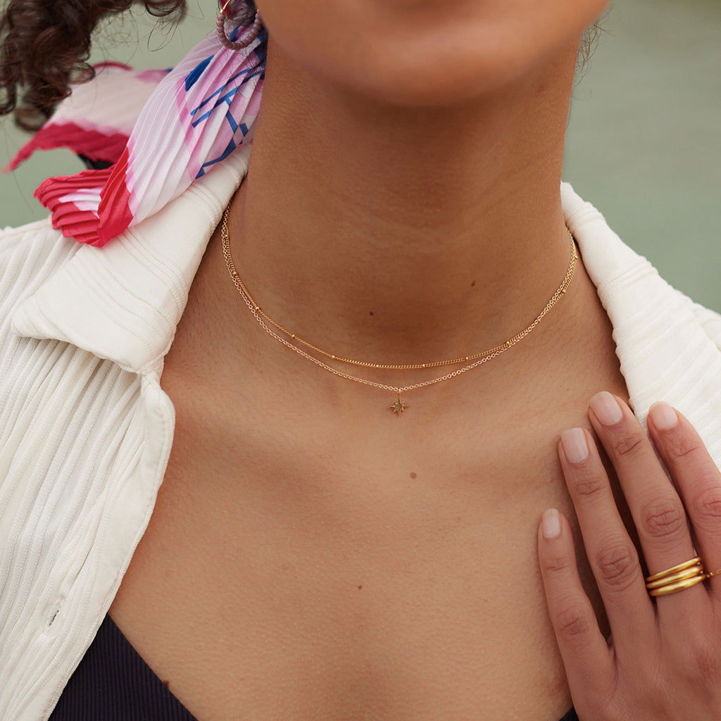 Wanderlust life 14k gold fill 17 inch Satellite necklace, with tactile gold bead accents and detailing. Perfect gift for layering gold chain necklaces. Proudly designed in Devon & handcrafted by our Wanderlust Life jewellery makers in the UK.